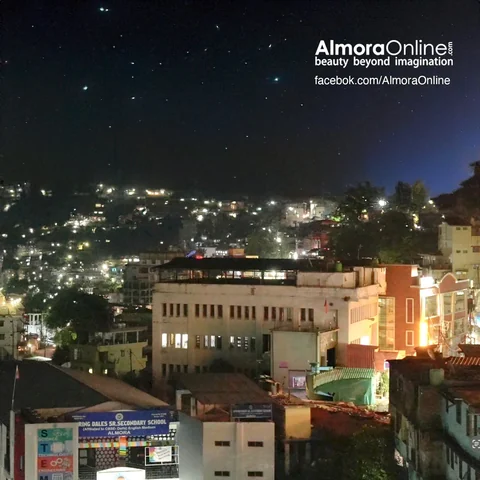 Lights across the hillside homes of Almora at night